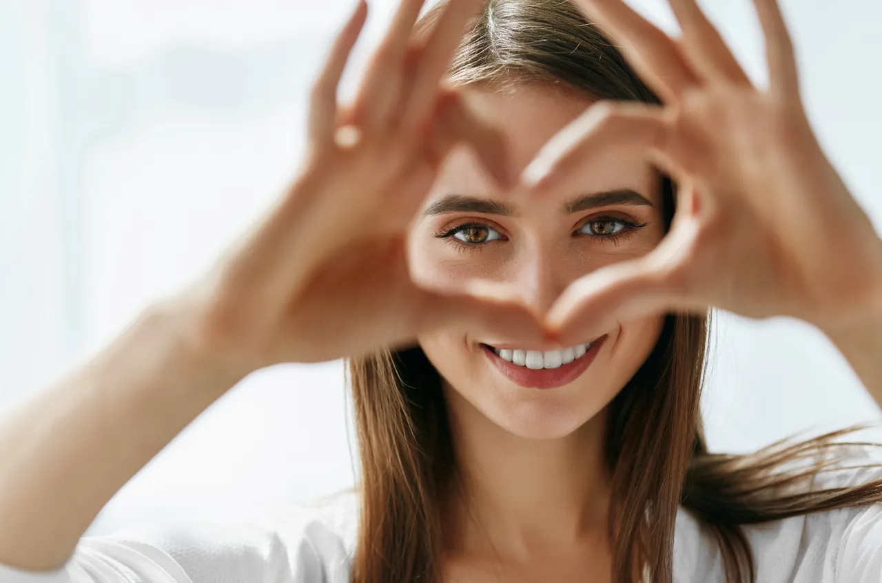 A happy patient smiling after treatment in Turkey.