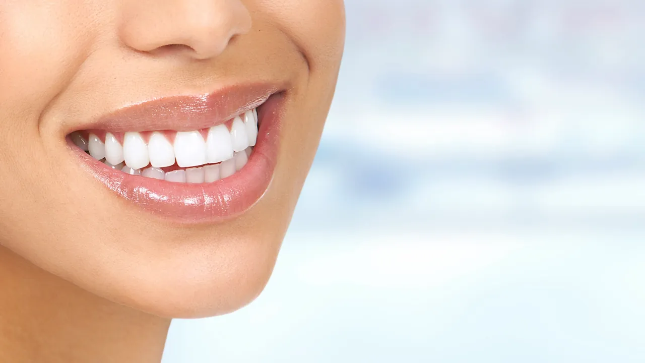 A close-up of a confident, healthy smile after dental treatment.